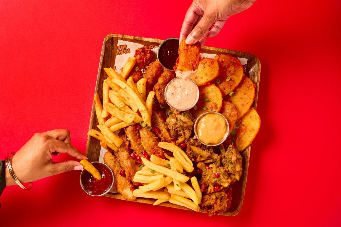 PS080725_0859PakoraShackPlatter_DipsHands2-1-scaled.jpg
